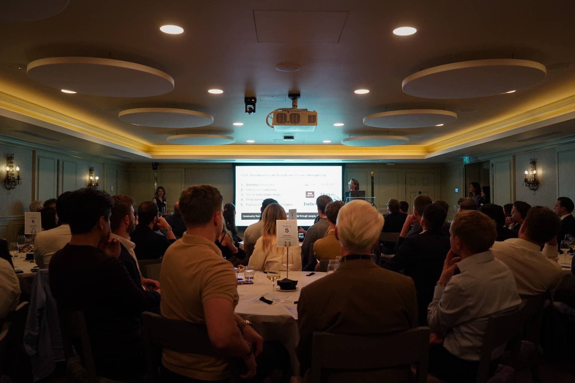 Founder pitching to the room at the AI Founder Pitch & Roundtable Night